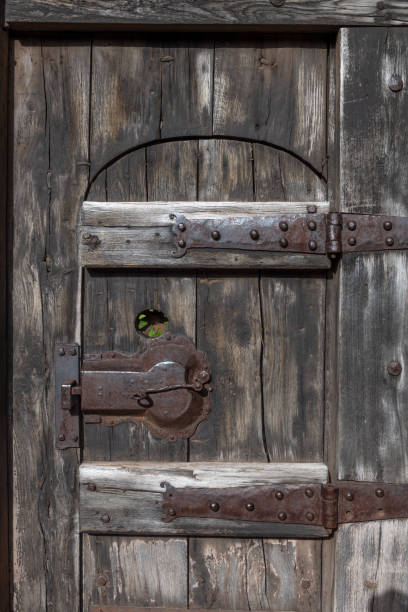 istock Wooden medieval door 1939804074