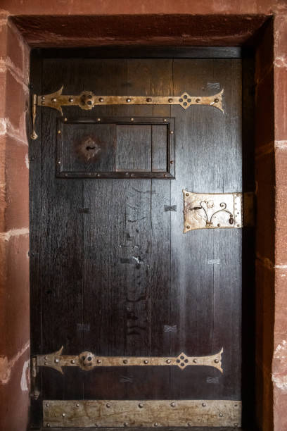 istock Wooden medieval door 1939818119