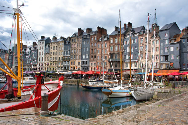 Honfleur, harbor basin with half-timbered houses and fishing boats