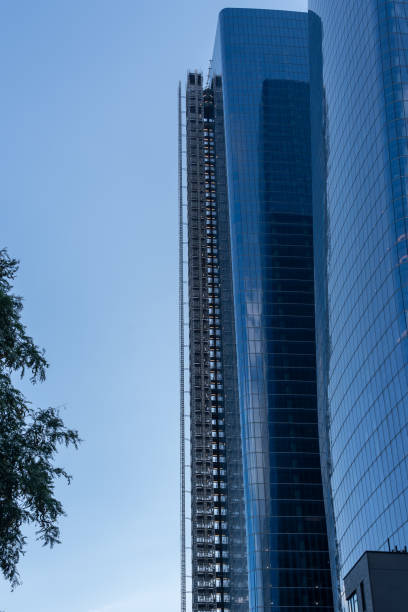 istock Construction elevator installed outside a modern new high rise building in New York, NY, USA 1939846972