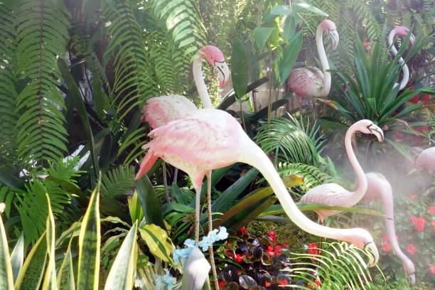 istock Flamingo statue in the garden at the day time. 1939856796