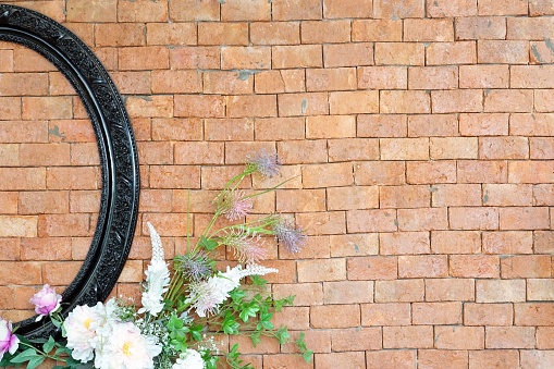 Wedding decoration on the brick wall background with copy space.