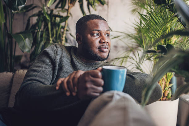 istock Man with Tablet Enjoying Morning Coffee 1939879775