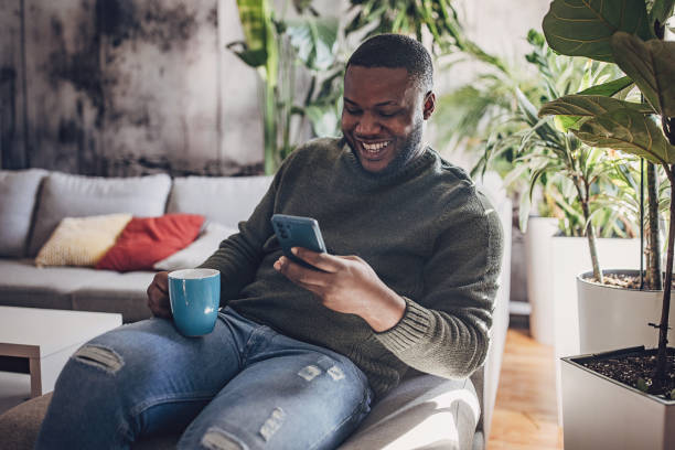 istock Joyful Selfie Moment on Couch 1939916418