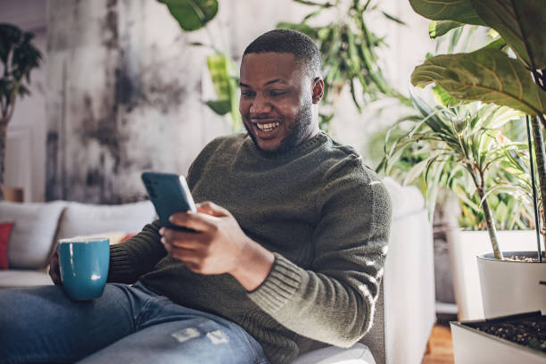 istock Joyful Selfie Moment on Couch 1939916428