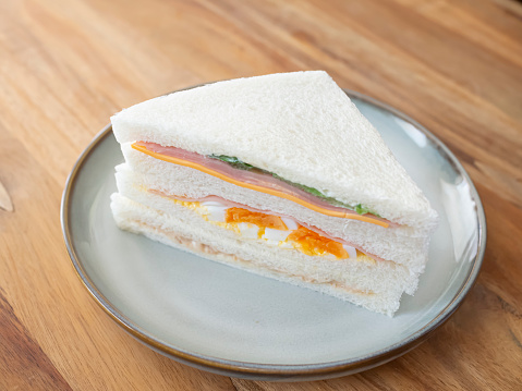 Sandwich with egg,ham,cheese and vegetable