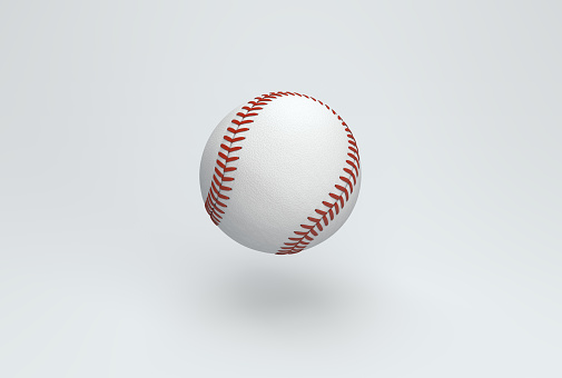 White Baseball Ball with Red Threads on a Gray Studio Background. Minimal concept. 3D render.