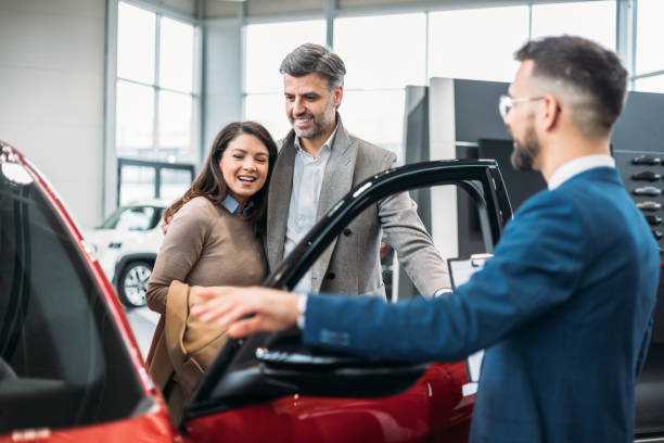 istock A couple in a Car Showroom 1939943092