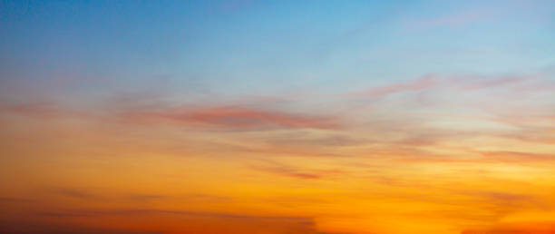 istock Morning and evening clouds and sky background,Orange Sky in the Evening,Dramatic and Wonderful Cloud on Twilight,Majestic Dark Blue Sky Nature Background,Colorful Cloud on summer season 1939952088