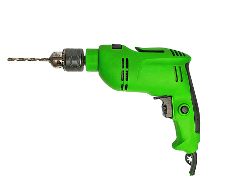 An electric hand drill isolated on a white background.