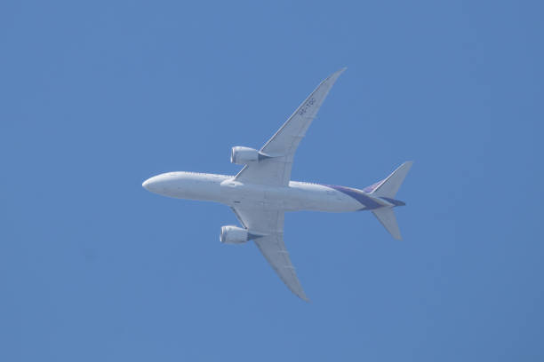 A Virgin Australia Boeing B737-8FE plane, registration VH-VUQ, taking off to the north from the third runway of Sydney Kingsford-Smith Airport as flight VA539 to the Gold Coast.  This image was taken from Ross Smith Avenue, Mascot on a sunny evening on 25 February 2024.