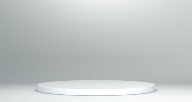 istock White Circle Shaped Podium With Shadow for Product Concept on a Soft Gray Studio Background . Minimal Concept. 1939967233