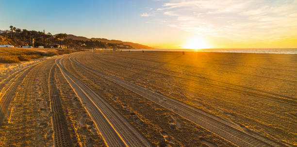 istock sun shining over Malibu at sunset 1939973912