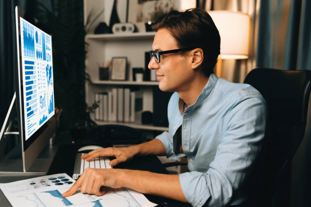 istock Smart businessman analyzing business paragraph marketing analysis. Pecuniary. 1939998223