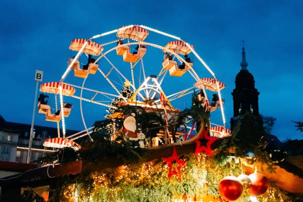 istock Retro carousel at the Dresden Christmas market, evening 1940031201