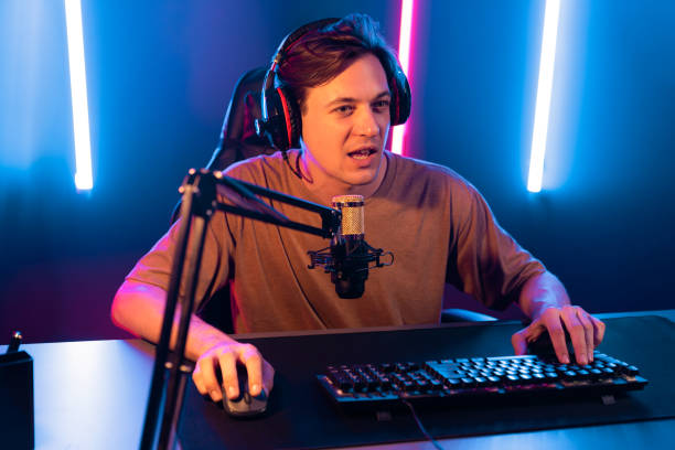 istock Host channel of smart streamer playing online game to be winner. Pecuniary. 1940040297