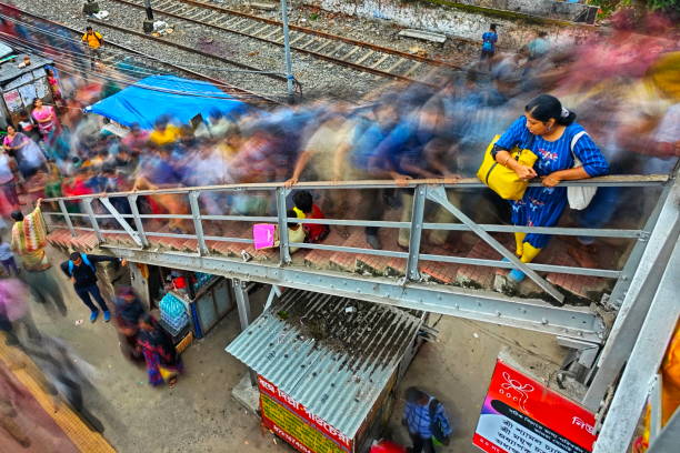 Busy passengers story on a railway platform in Kolkata, India.
