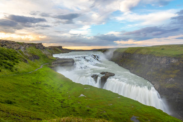 istock Masses of water cascade down Gullfoss, creating a misty spray at the edge. 1940062731