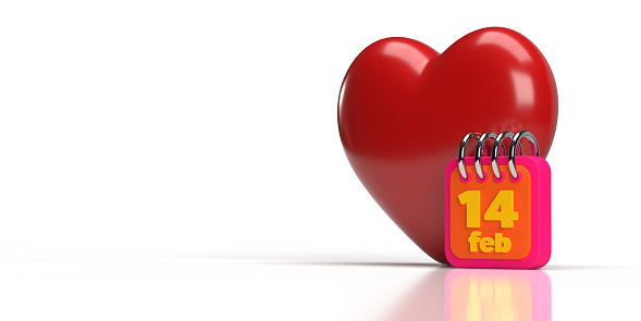 Red coloured heart on the back of a small valentine calendar. Valentine's day celebration and reminder concept. large copy space on white background. Easily changeable background and cuttable objects thanks to clipping path feature.