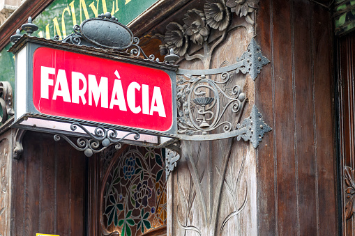 Modernist Pharmacy sign (Farmacia in Spanish), El Eixample neighborhood, Barcelona, Catalonia, Spain, Europe