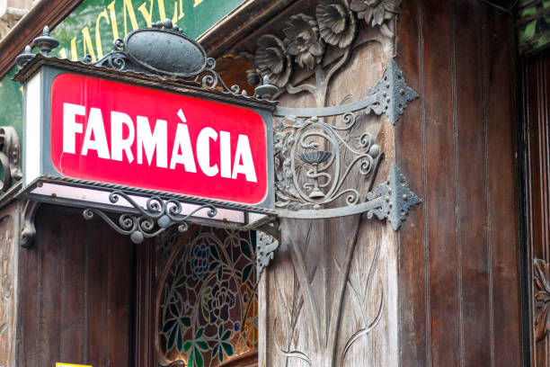 Modernist Pharmacy sign (Farmacia in Spanish), El Eixample neighborhood, Barcelona, Catalonia, Spain, Europe Modernist Pharmacy sign (Farmacia in Spanish), El Eixample neighborhood, Barcelona, Catalonia, Spain, Europe farmacia stock pictures, royalty-free photos & images