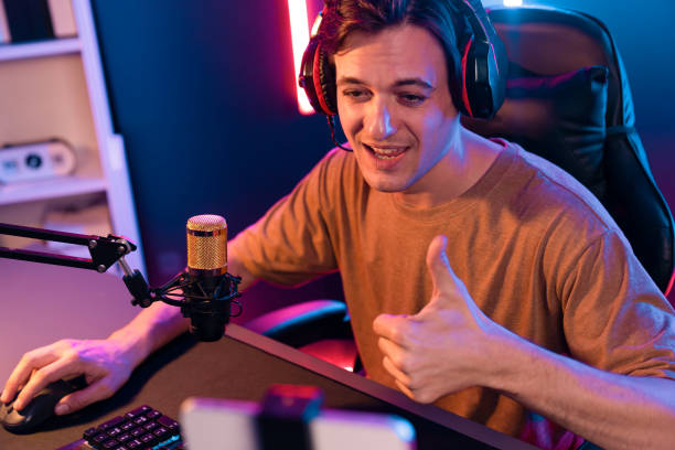 istock Host channel of smart streamer playing online game to be winner. Pecuniary. 1940091855