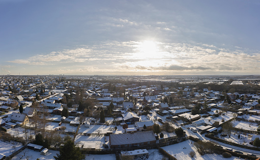 Drone point of view of city covered in snow