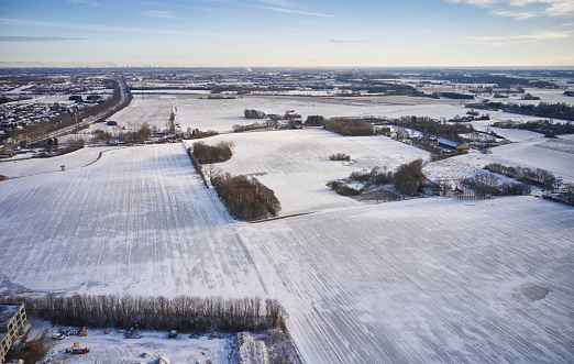 Landscape covered in snow from drone point of view.
