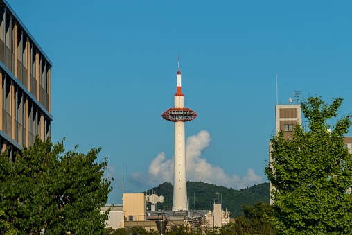 Kyoto Tower seen from the East part of the city during the early evening.