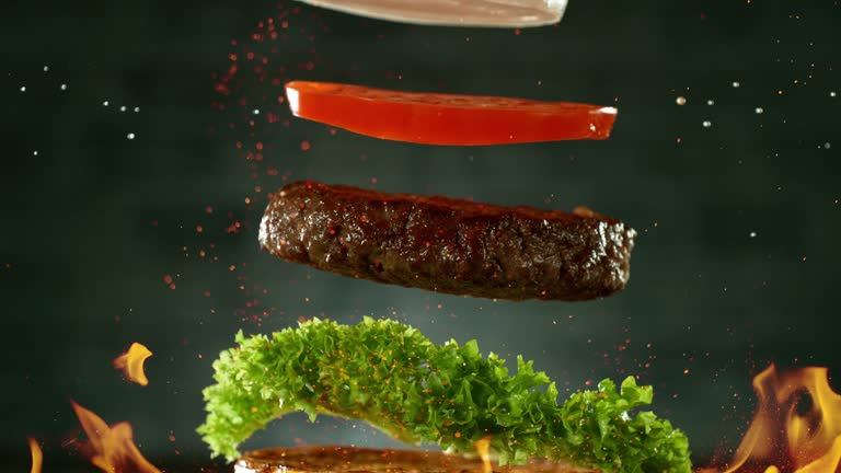 Beef Burger Ingredients Falling and Landing in the Bun