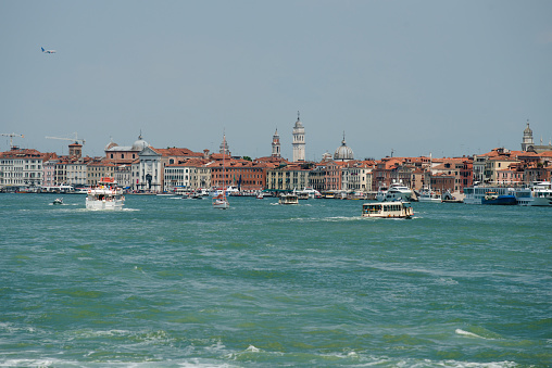 View of the Grand Canal, Venice, Italy, from Rialto Bridge. Buildings and boats.