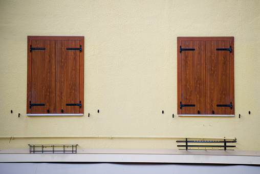 Rustic vintage window on red wall