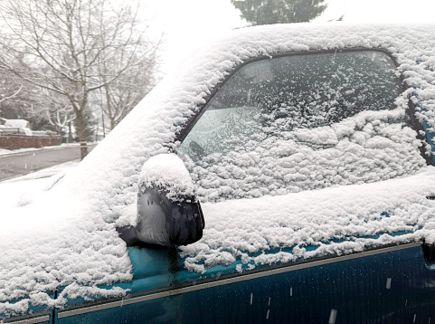 Cars covered with snow during snow storm in Montreal, Canada (2019)