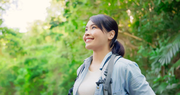 istock Asian woman hiking in mountain 1940235362