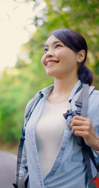 istock Asian woman hiking in mountain 1940236461