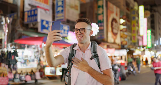istock man visit the night market 1940250884