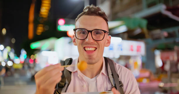 istock man visit the night market 1940251418