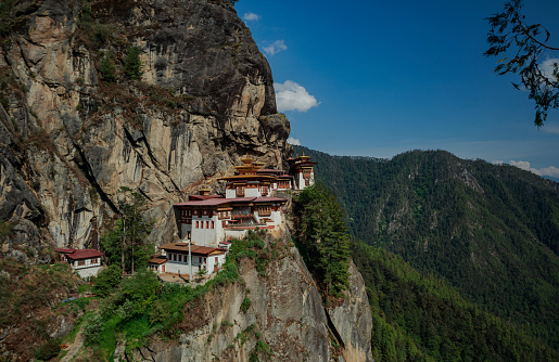 Paro Taktsang (Dzongkha: སྤ་གྲོ་སྟག་ཚང་, also known as the Taktsang Palphug Monastery and the Tiger's Nest), is a sacred Vajrayana Himalayan Buddhist site located in the cliffside of the upper Paro valley in Bhutan. It is one of thirteen Tiger's Nest caves in historical Tibet in which Padmasambhava practiced and taught Vajrayana.\n\nA later monastery complex was built in 1692, around the Taktsang Senge Samdup cave, where Guru Padmasambhava meditated and practiced with students including Yeshe Tsogyal before departing the kingdom of Tibet in the early 9th century. Padmasambhava is credited with introducing Vajrayana Buddhism to Bhutan, which was then part of Tibet, and is the tutelary deity of the country. Today, Paro Taktsang is the best known of the thirteen taktsang or \