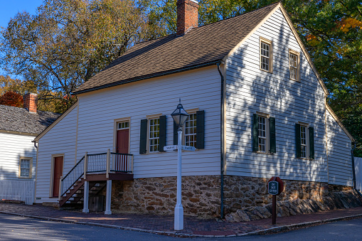 Old Salem, North Carolina, USA - October 26, 2023: An attractive building on the corner of Main and Race streets .