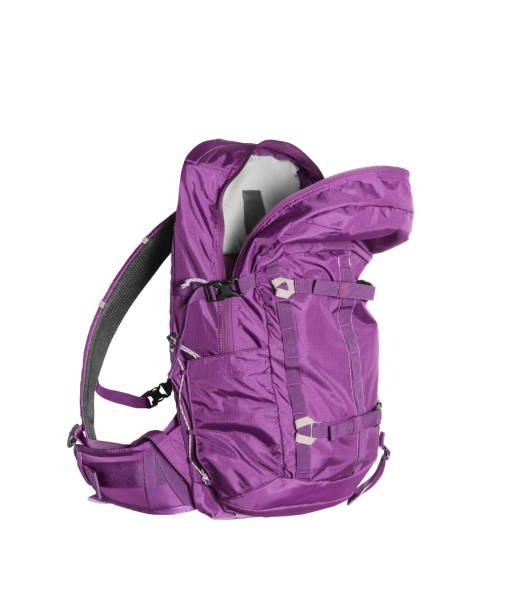 istock Open backpack of purple color isolated on white background 1940322131