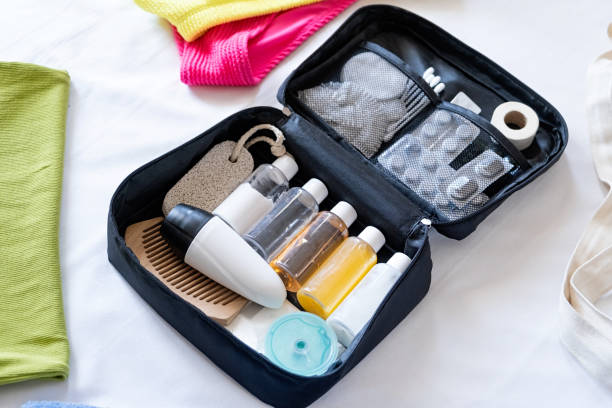 istock Travel cosmetics kit on bed , top view 1940400169
