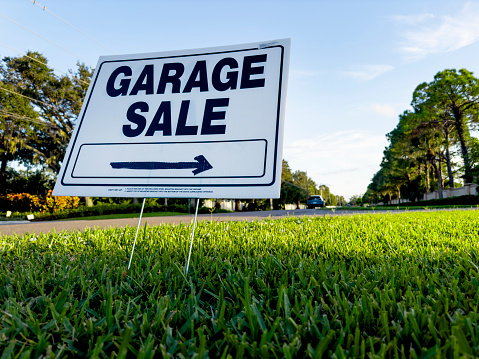 Close up Outdoor Garage Sale Sign in Florida