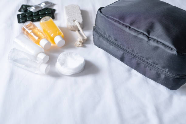 istock Travel cosmetics kit on bed , top view 1940401773