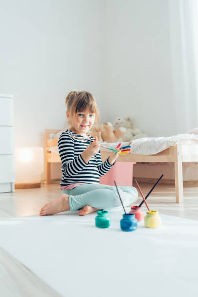 istock Little girl drawing 1940408141