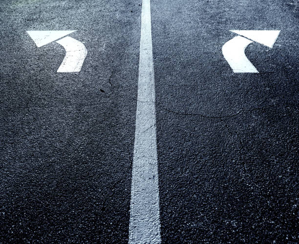 Close up arrow signs on asphalt city road in Florida