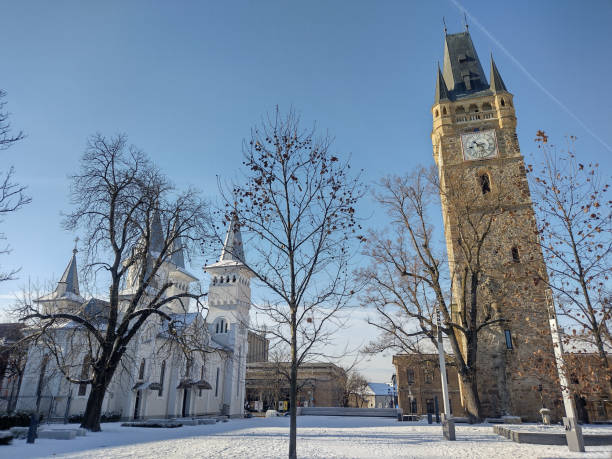 Stephen Tower and an Orthodox church in Baia Mare, Romania