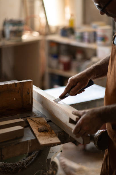 istock Senior male carpenter working 1940487992