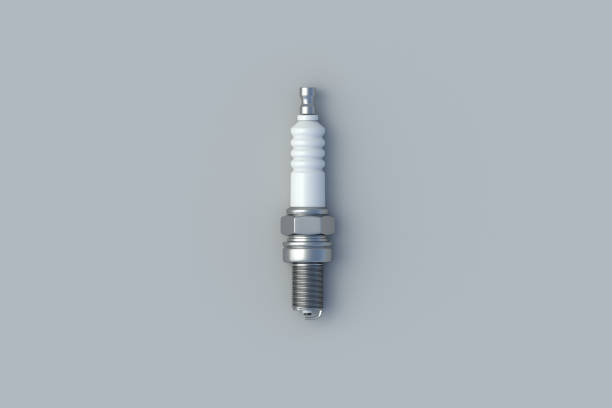 una candela per auto su sfondo grigio. componenti automobilistici. distributore di benzina. riparazione del motore. attrezzatura per auto. manutenzione della motocicletta. vista dall'alto. rendering 3d - spark plug electrode transportation workshop foto e immagini stock