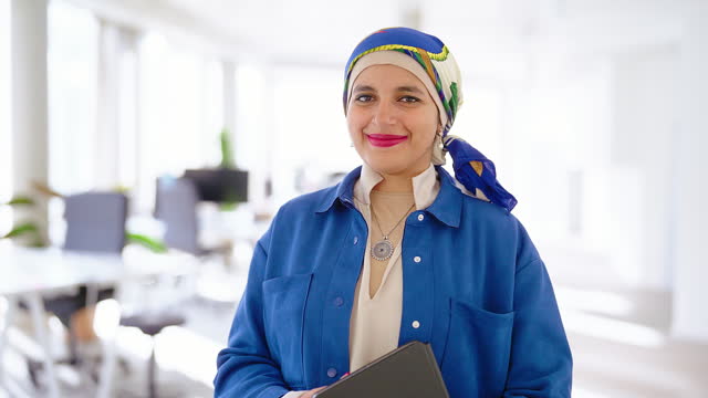 Portrait of a middle eastern woman entrepreneur at coworking office space