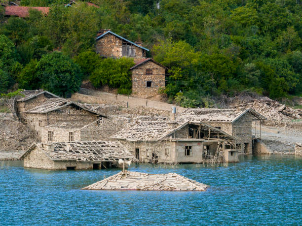 Aerial view of sunken village by dam waters. Taken via drone. Isparta, Türkiye.